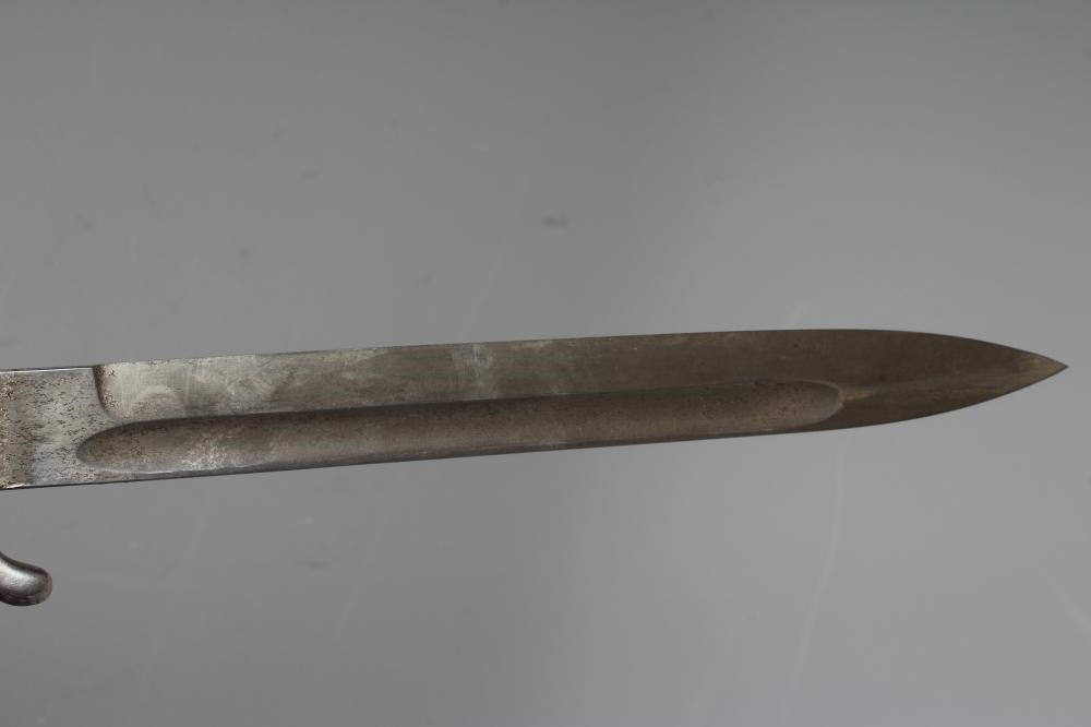 A GERMAN FIRE SERVICE DRESS BAYONET with 9 3/4" blade, serpentine hand guard, steel scabbard and Image