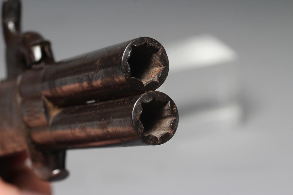A PERCUSSION TURN BARREL PISTOL by Egan Image