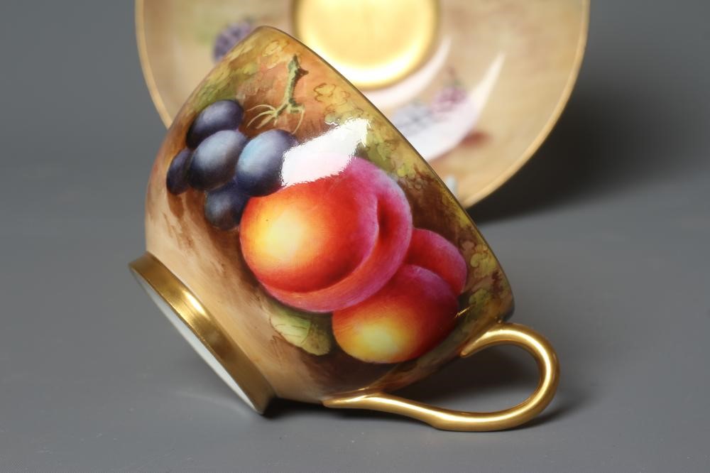 A ROYAL WORCESTER CABINET CUP AND SAUCER Image