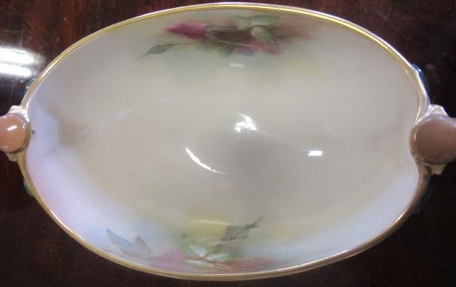 A ROYAL WORCESTER SMALL CENTRE PEDESTAL BOWL Image