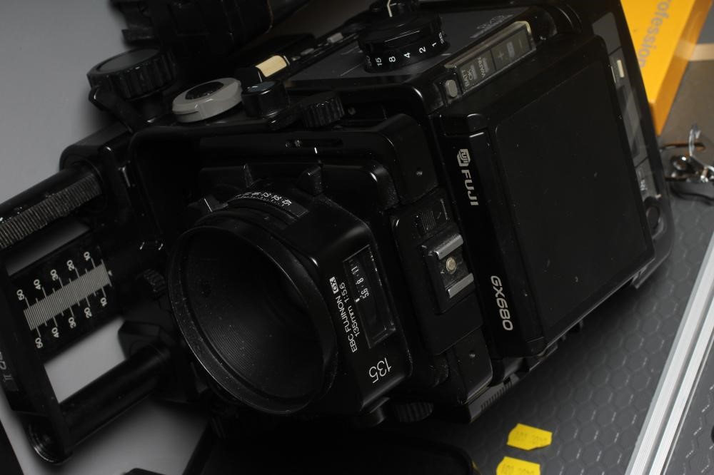 A FUJI GX680 II PROFESSIONAL CAMERA with 135 1:5.6 EBC Fujinon GX lens, Metz 45 CT-5 flash and alloy Image