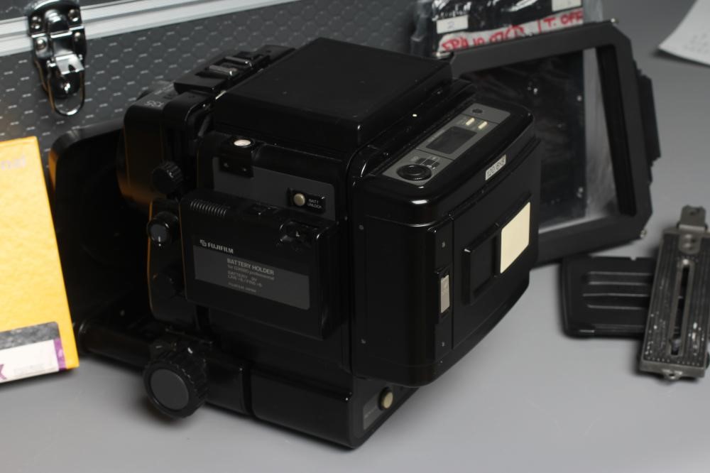 A FUJI GX680 II PROFESSIONAL CAMERA with 135 1:5.6 EBC Fujinon GX lens, Metz 45 CT-5 flash and alloy Image