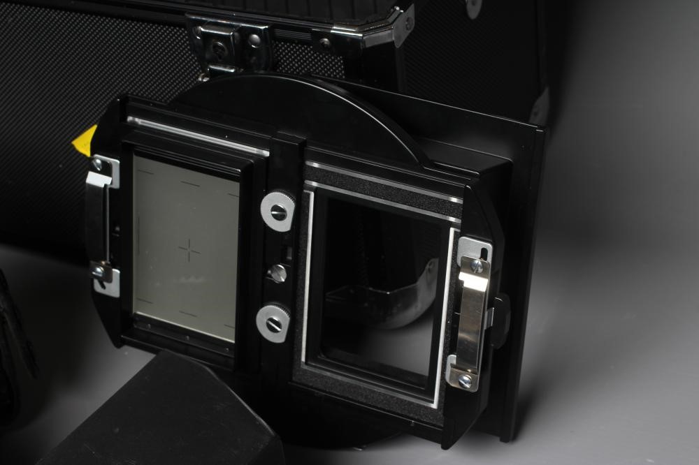 A TOPCON HORSEMAN 45HF CAMERA with a Super Topcor 1:56 f=150mm lens, rotary back, viewer and black Image