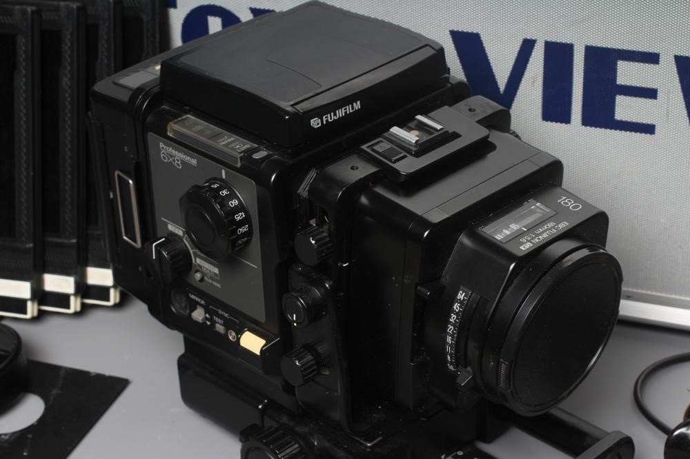 A FUJI PROFESSIONAL 6X8 CAMERA with EBC Fujinon 180mm 1:5.6 180 lens and metal carrying case (Est. Image