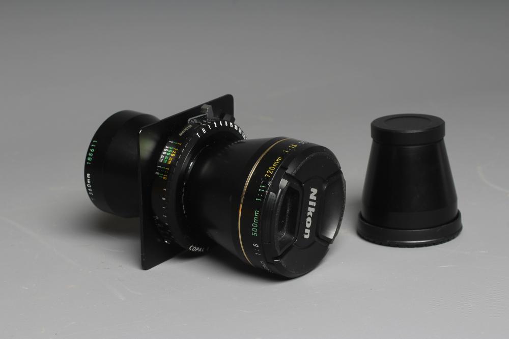 A NIKON NIKKOR-T ED 360MM 1:8 LENS numbered up to 720mm, with lens cap, 360mm rear lens and 500mm Image