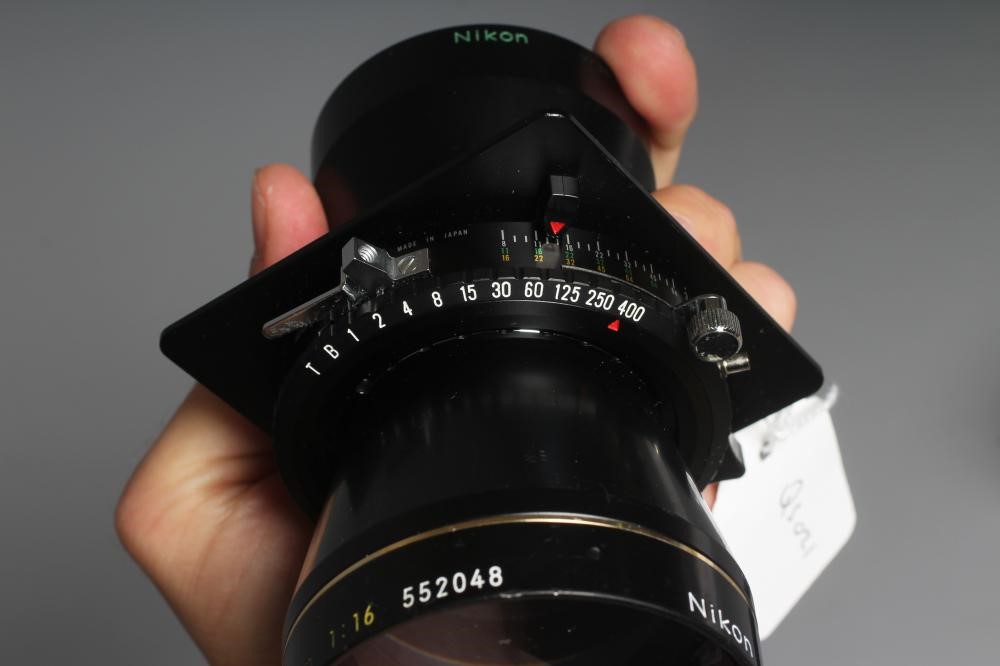 A NIKON NIKKOR-T ED 360MM 1:8 LENS numbered up to 720mm, with lens cap, 360mm rear lens and 500mm Image