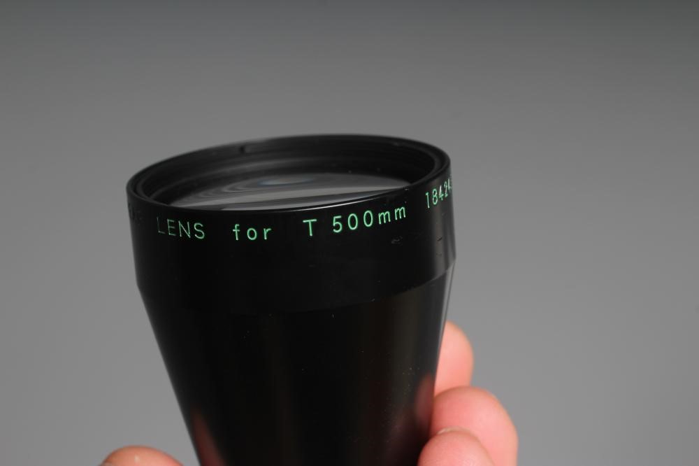 A NIKON NIKKOR-T ED 360MM 1:8 LENS numbered up to 720mm, with lens cap, 360mm rear lens and 500mm Image