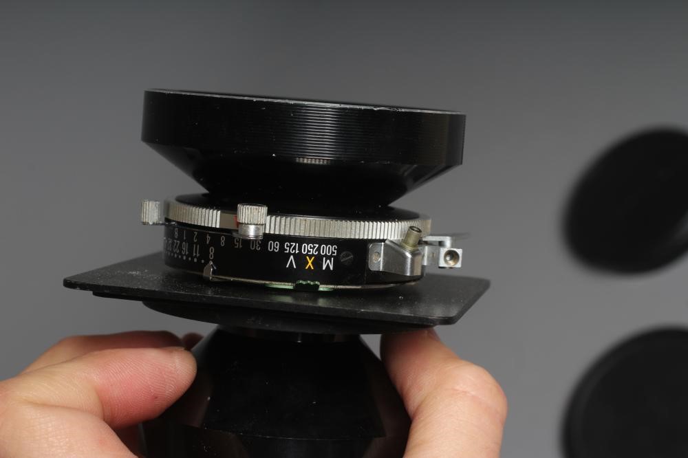 TWO CAMERA LENSES, comprising a Copal No.1 Symmar-S 5,6/210 lens, and a Fujinon SW 1:8/90 lens (Est. Image