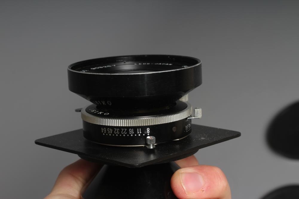 TWO CAMERA LENSES, comprising a Copal No.1 Symmar-S 5,6/210 lens, and a Fujinon SW 1:8/90 lens (Est. Image