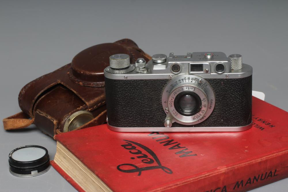A LEICA CAMERA, no. 263731, with Leitz Elmar f=5cm 1:35 lens, leather case and manual (Est. plus 24% Image