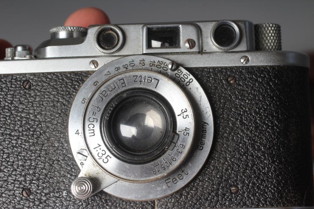 A LEICA CAMERA, no. 263731, with Leitz Elmar f=5cm 1:35 lens, leather case and manual (Est. plus 24% Image