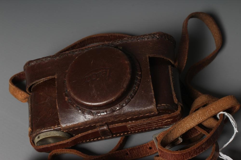 A LEICA CAMERA, no. 263731, with Leitz Elmar f=5cm 1:35 lens, leather case and manual (Est. plus 24% Image