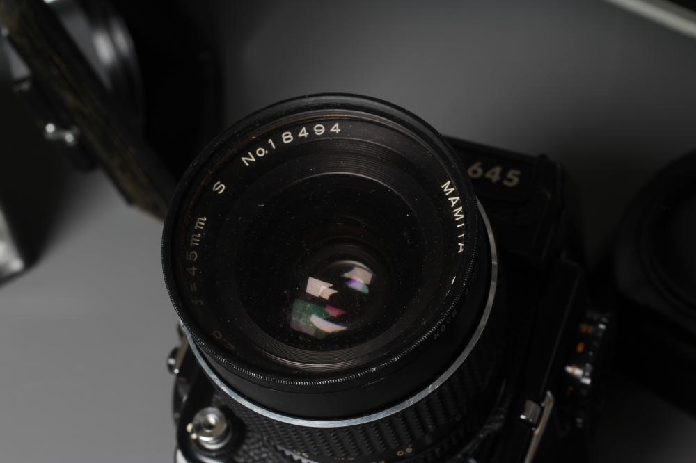 A MAMIYA 645 PROFESSIONAL CAMERA, M645 1000S, with Mamiya-Sekor C 1:2,8 f=45mm S no. 18494 lens, a Image