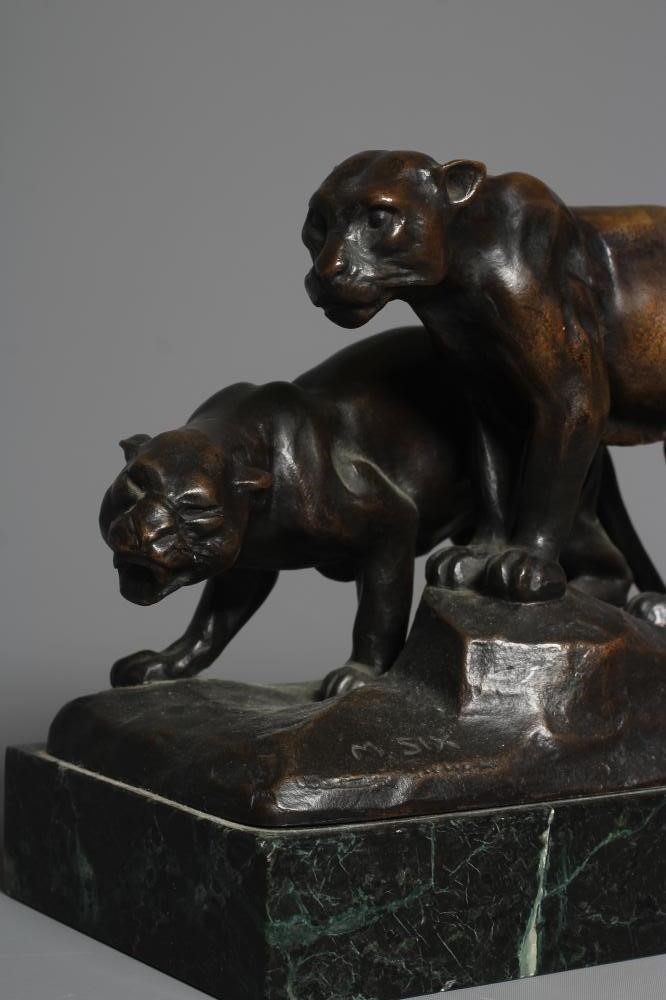 MICHAEL SIX (1874-1938) Mountain Lions, signed, bronze with brown patina, rectangular marble base, Image