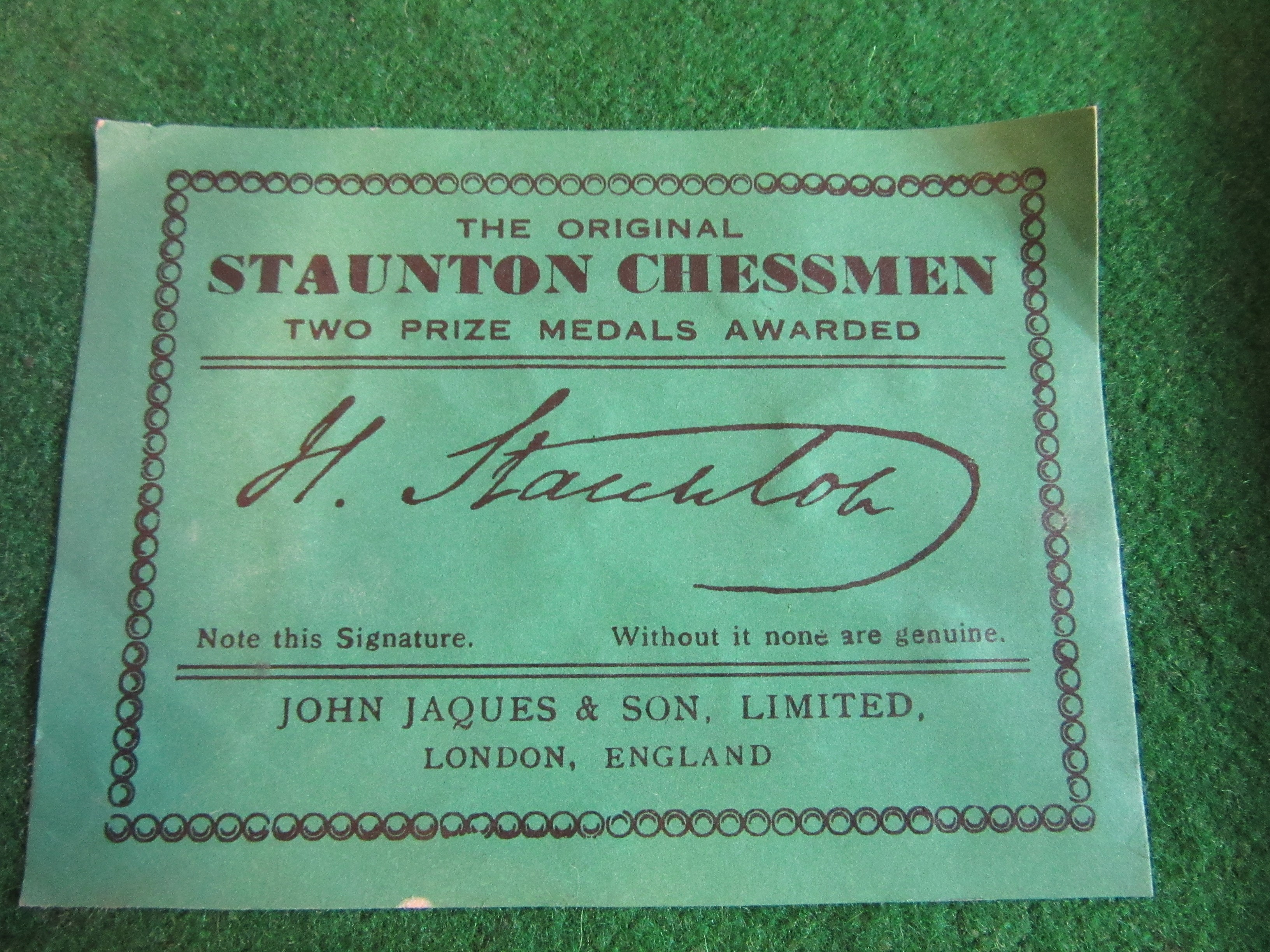 A JAQUES STAUNTON CHESS SET, c.1981, in box and ebony, weighted, in green baize lined box with Image