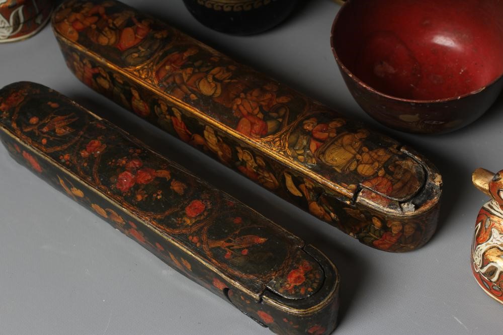 NINE PERSIAN SCHOOL LACQUERED PAPIER MACHE ITEMS comprising two pen boxes Image