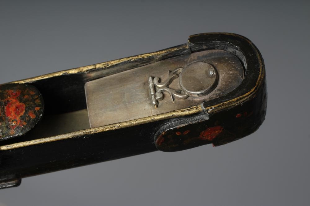 NINE PERSIAN SCHOOL LACQUERED PAPIER MACHE ITEMS comprising two pen boxes Image
