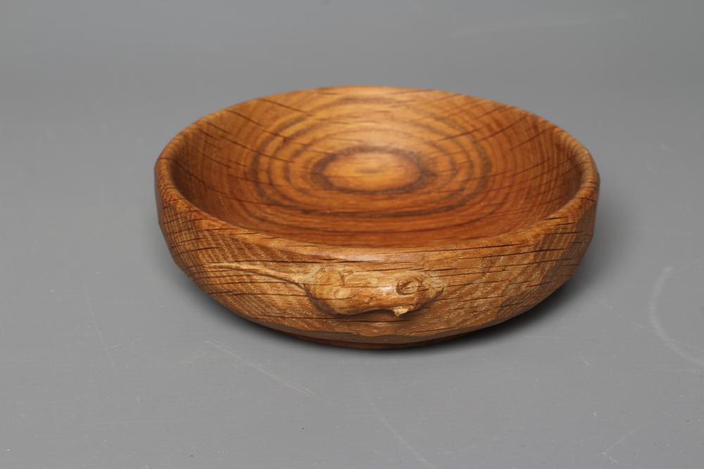 A ROBERT THOMPSON ADZED OAK BOWL with carved mouse trademark, 6" diameter (Est. plus 24% premium Image