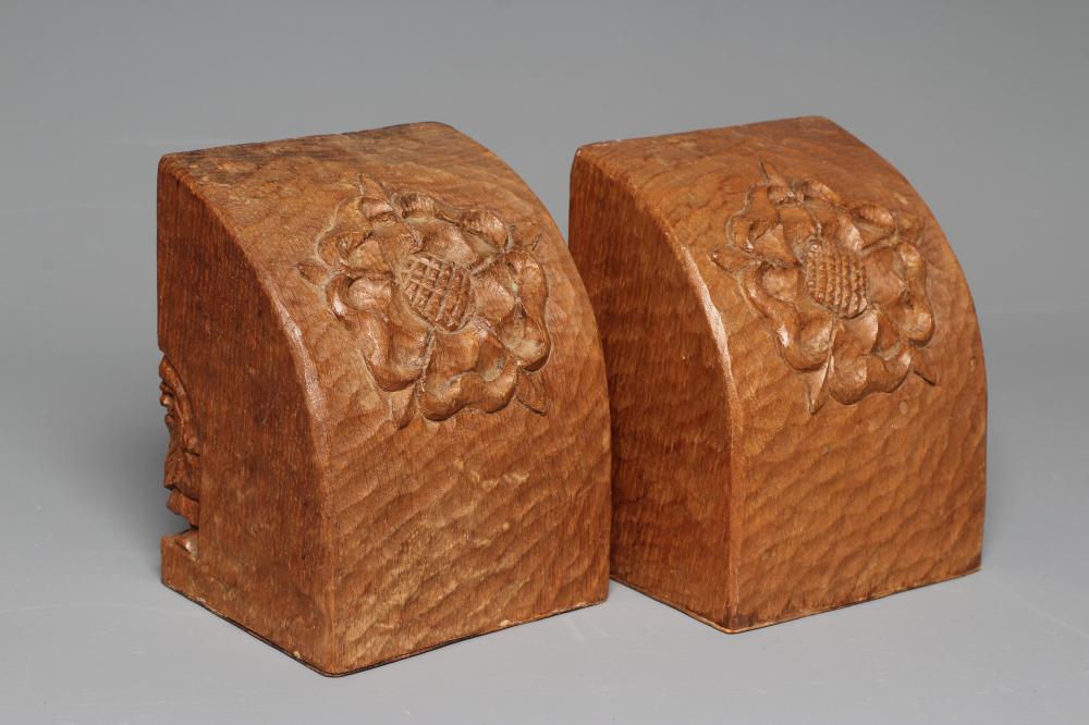 A PAIR OF THOMAS WHITTAKER OAK BOOKENDS of domed form carved with a Yorkshire Rose and incised gnome Image