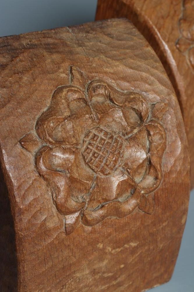 A PAIR OF THOMAS WHITTAKER OAK BOOKENDS of domed form carved with a Yorkshire Rose and incised gnome Image