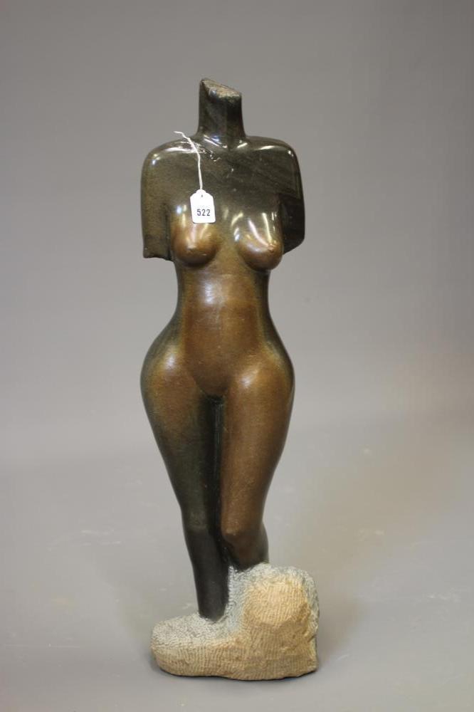 ANDREW KANDEMIRI - A POLISHED OPAL STONE FEMALE TORSO, late 20th century, light to dark brown Image