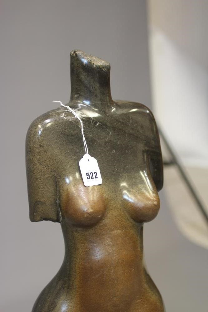 ANDREW KANDEMIRI - A POLISHED OPAL STONE FEMALE TORSO, late 20th century, light to dark brown Image