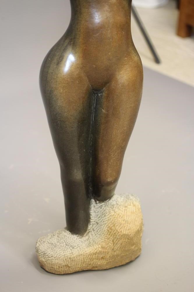 ANDREW KANDEMIRI - A POLISHED OPAL STONE FEMALE TORSO, late 20th century, light to dark brown Image