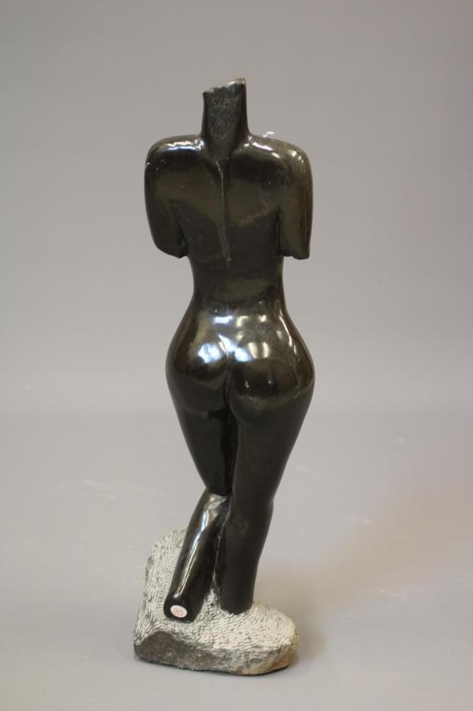 ANDREW KANDEMIRI - A POLISHED OPAL STONE FEMALE TORSO, late 20th century, light to dark brown Image