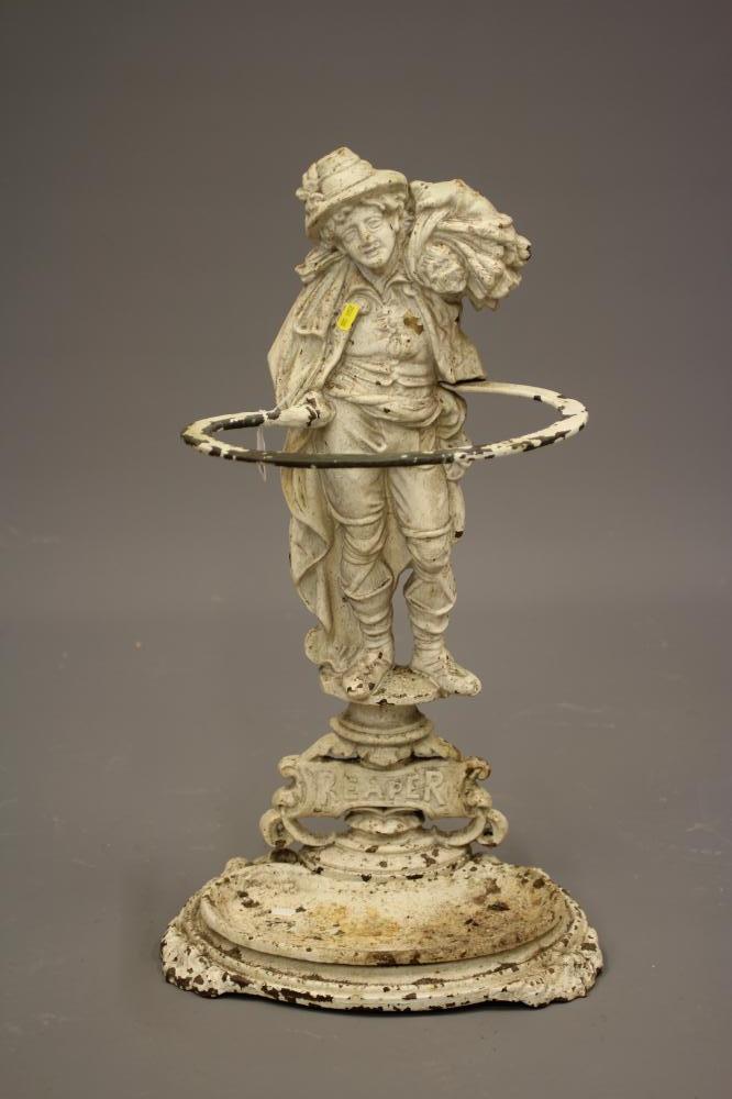 A VICTORIAN CAST IRON REAPER STICK STAND Image