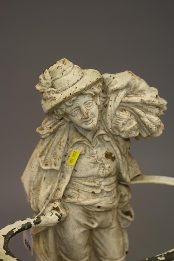 A VICTORIAN CAST IRON REAPER STICK STAND Image