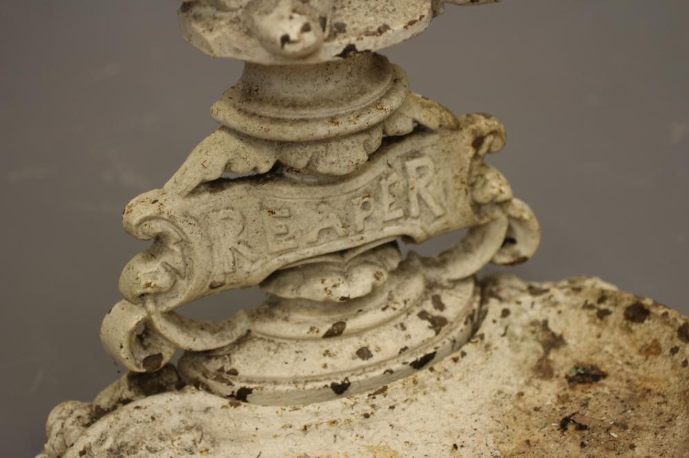 A VICTORIAN CAST IRON REAPER STICK STAND Image