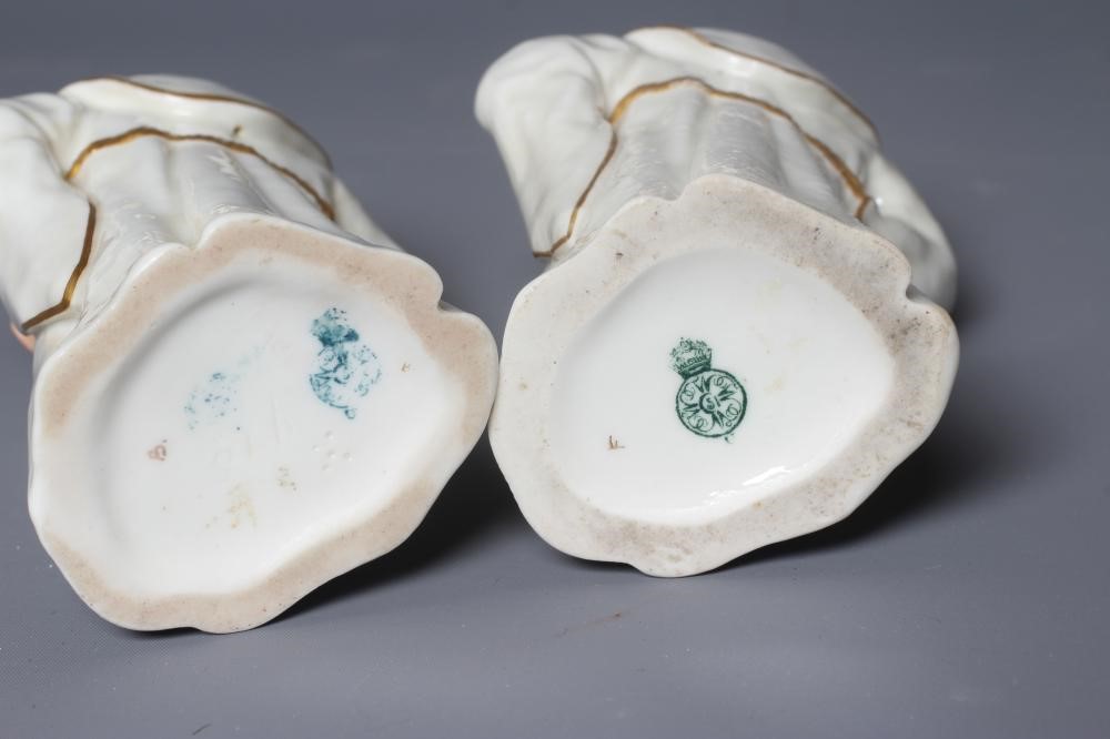 TWO ROYAL WORCESTER WHITE MONKS, 1883, modelled by James Hadley, each standing with his left hand on Image