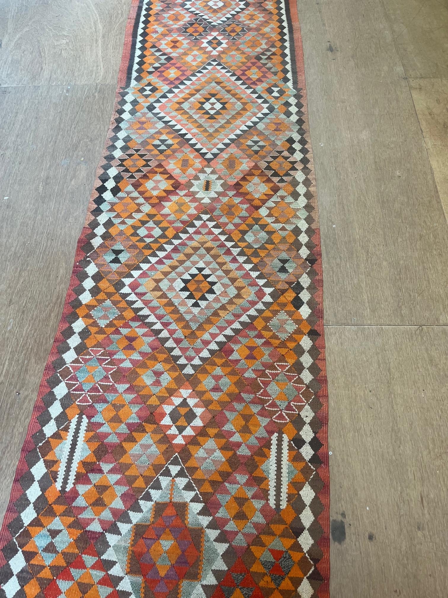 A JORDANIAN KILIM FLAT WEAVE WOOL RUNNER Image