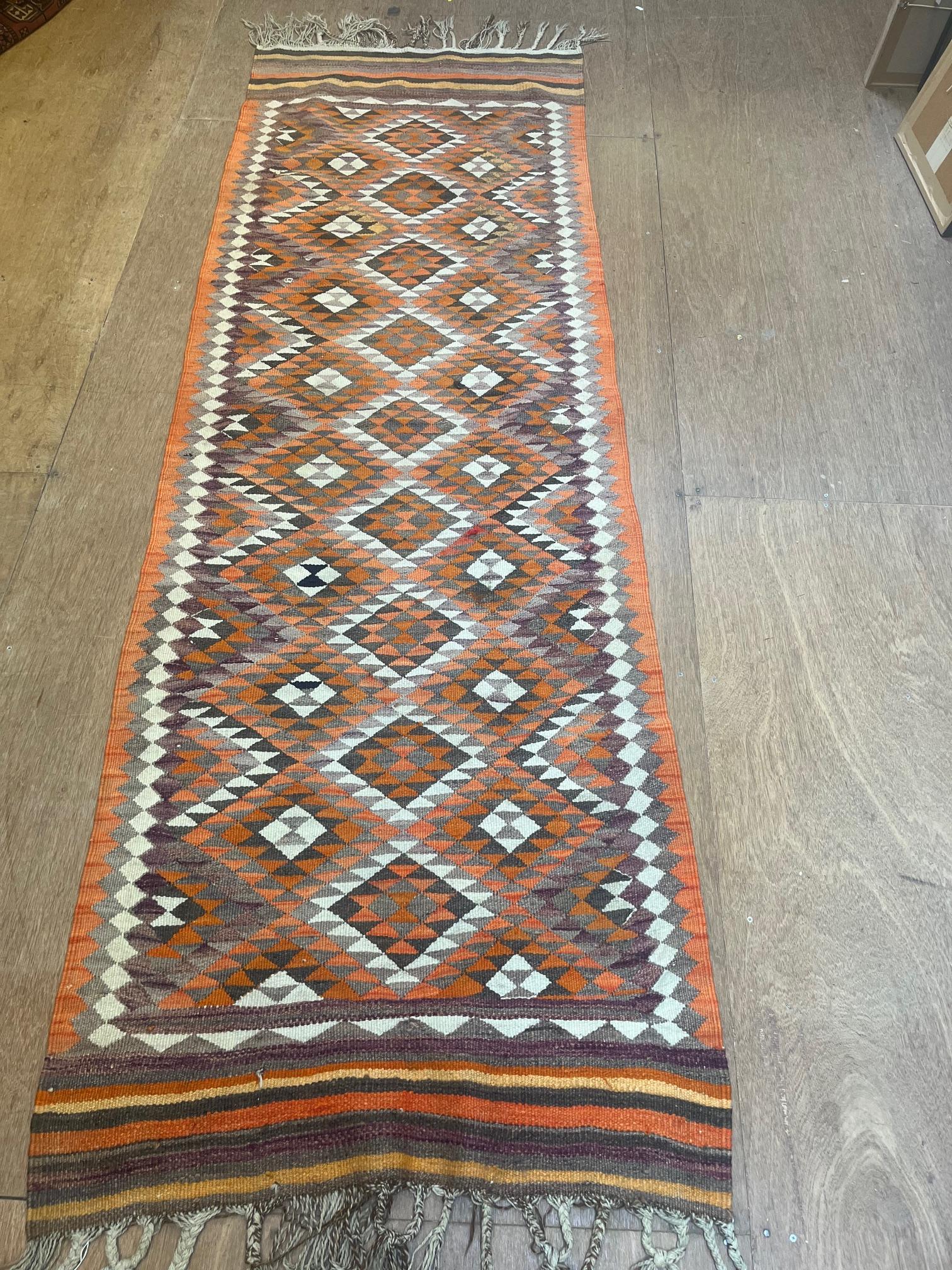 A JORDANIAN KILIM FLAT WEAVE WOOL RUNNER Image