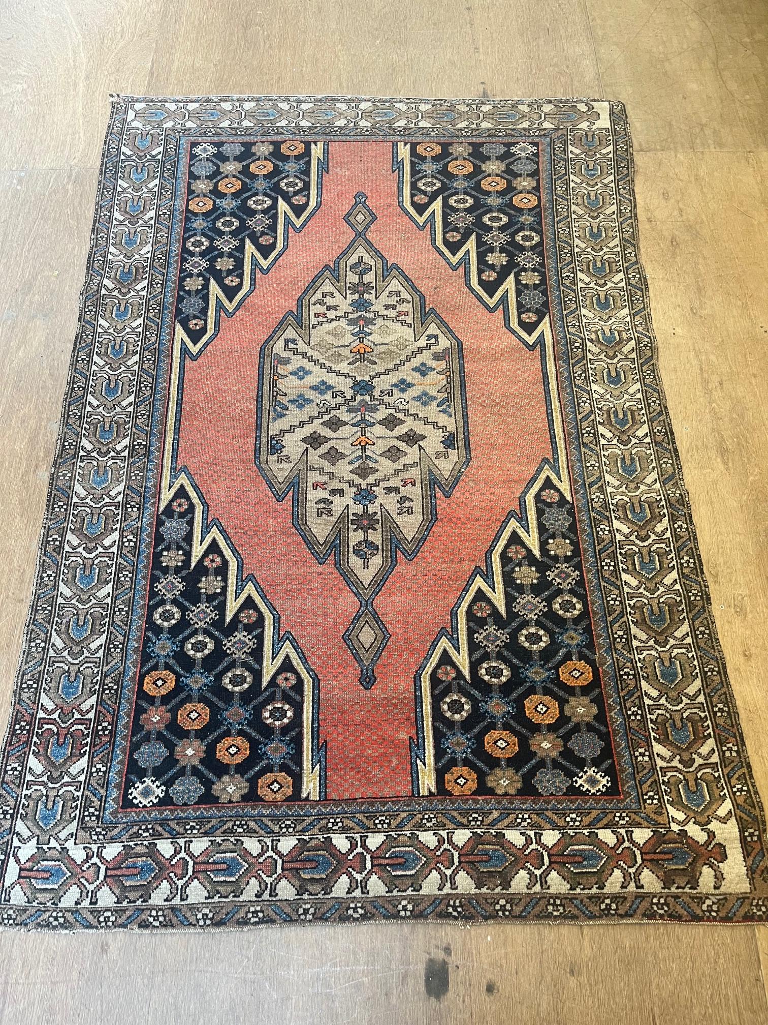 A NORTH WEST PERSIAN TRIBAL RUG Image
