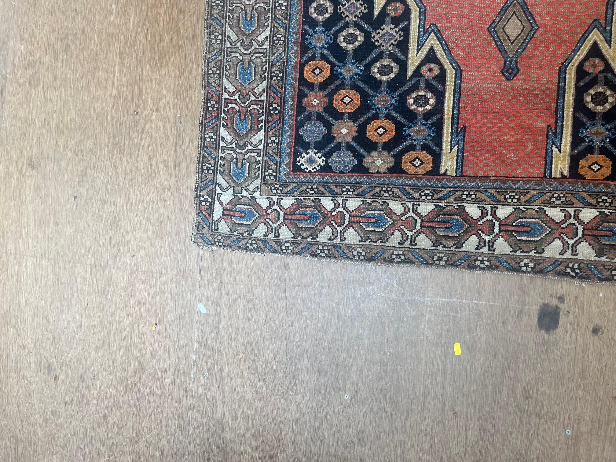 A NORTH WEST PERSIAN TRIBAL RUG Image