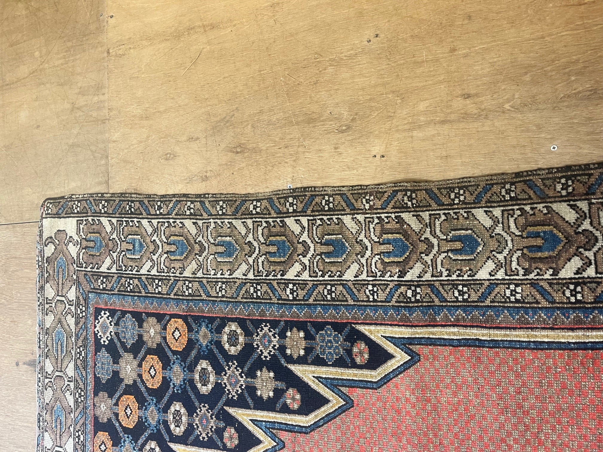 A NORTH WEST PERSIAN TRIBAL RUG Image