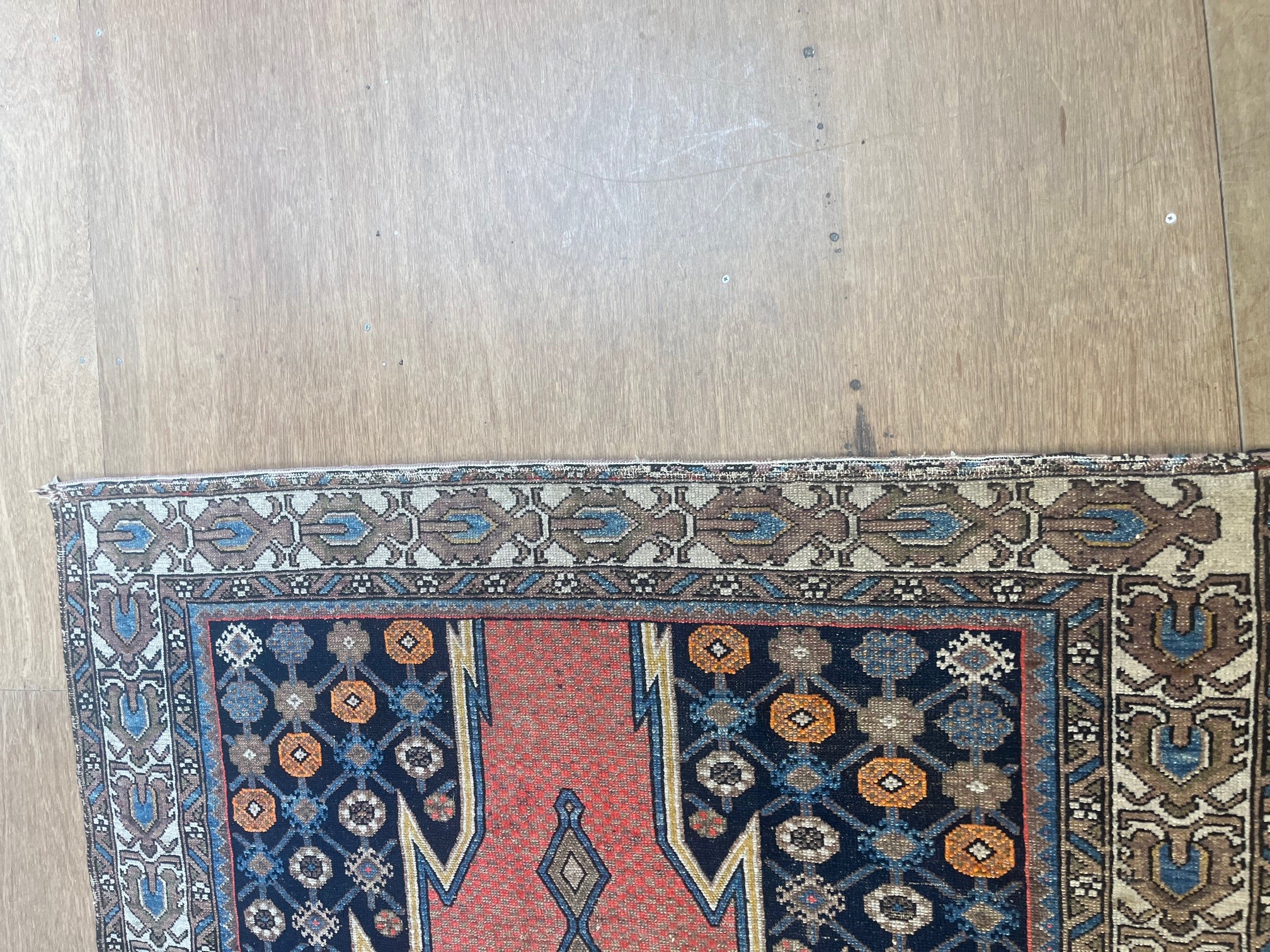 A NORTH WEST PERSIAN TRIBAL RUG Image