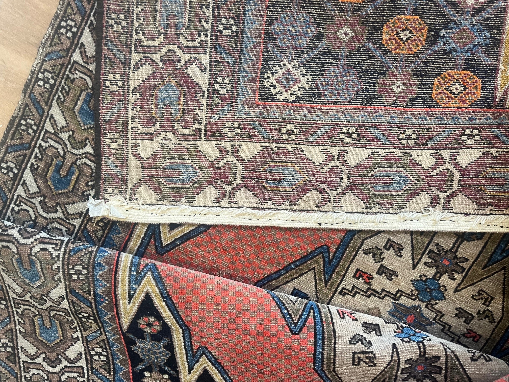 A NORTH WEST PERSIAN TRIBAL RUG Image