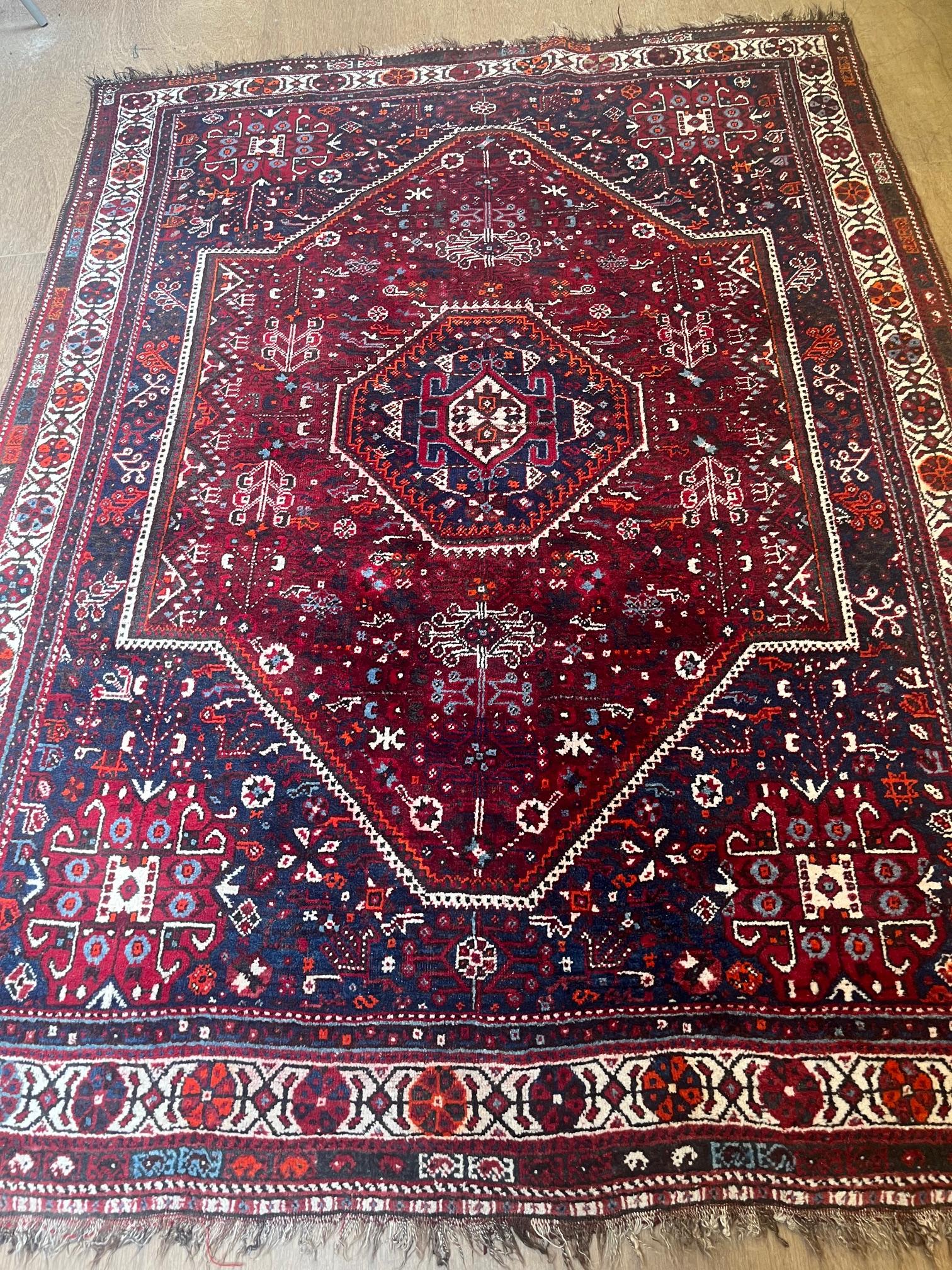 A PERSIAN TRIBAL RUG Image