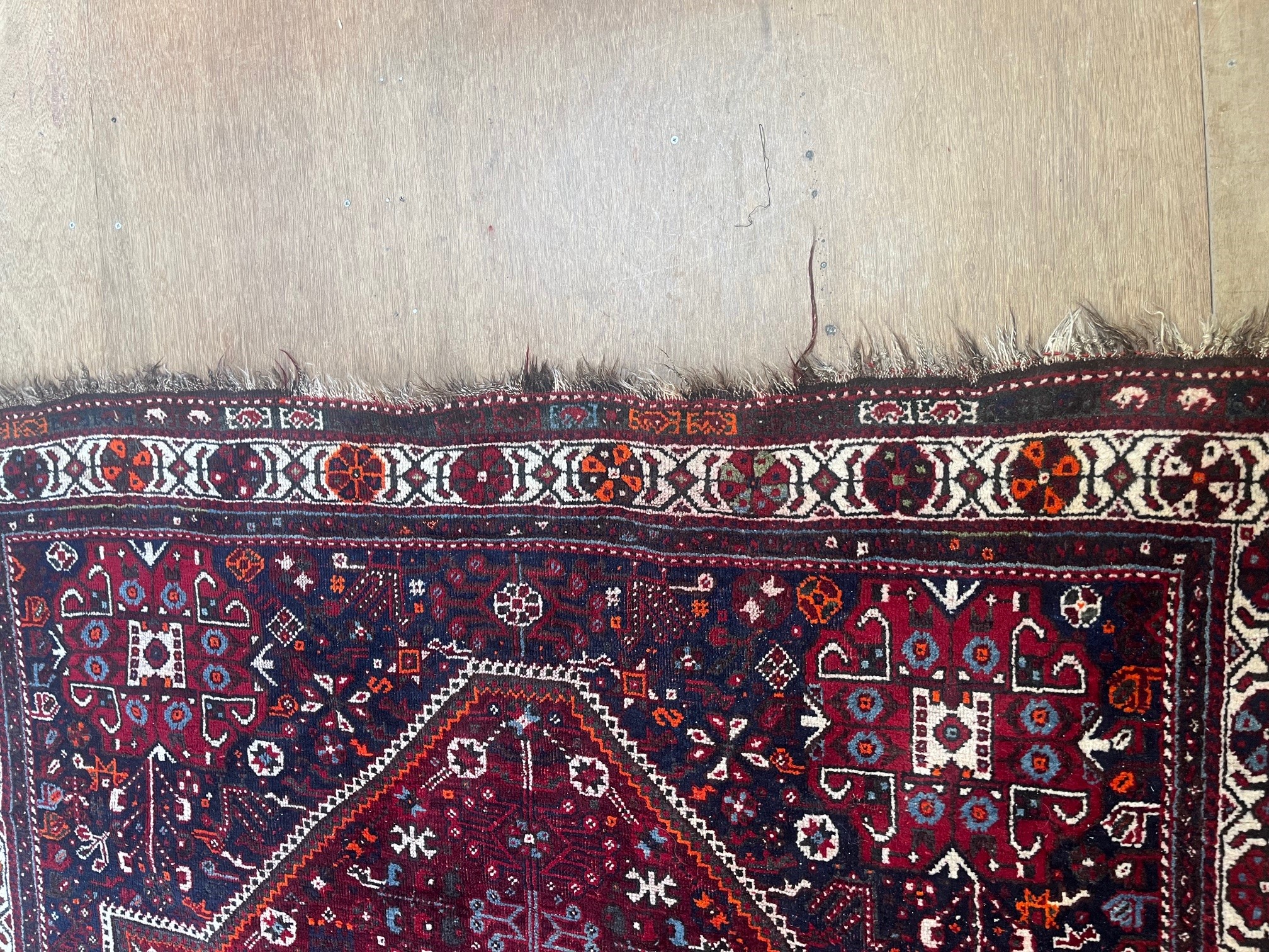 A PERSIAN TRIBAL RUG Image