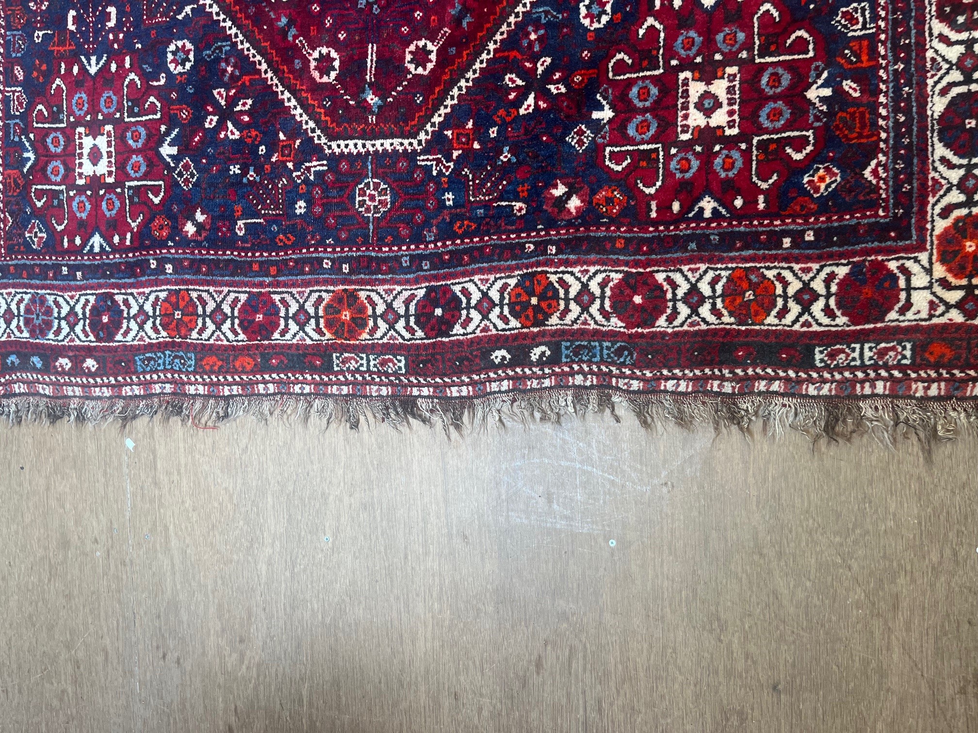 A PERSIAN TRIBAL RUG Image