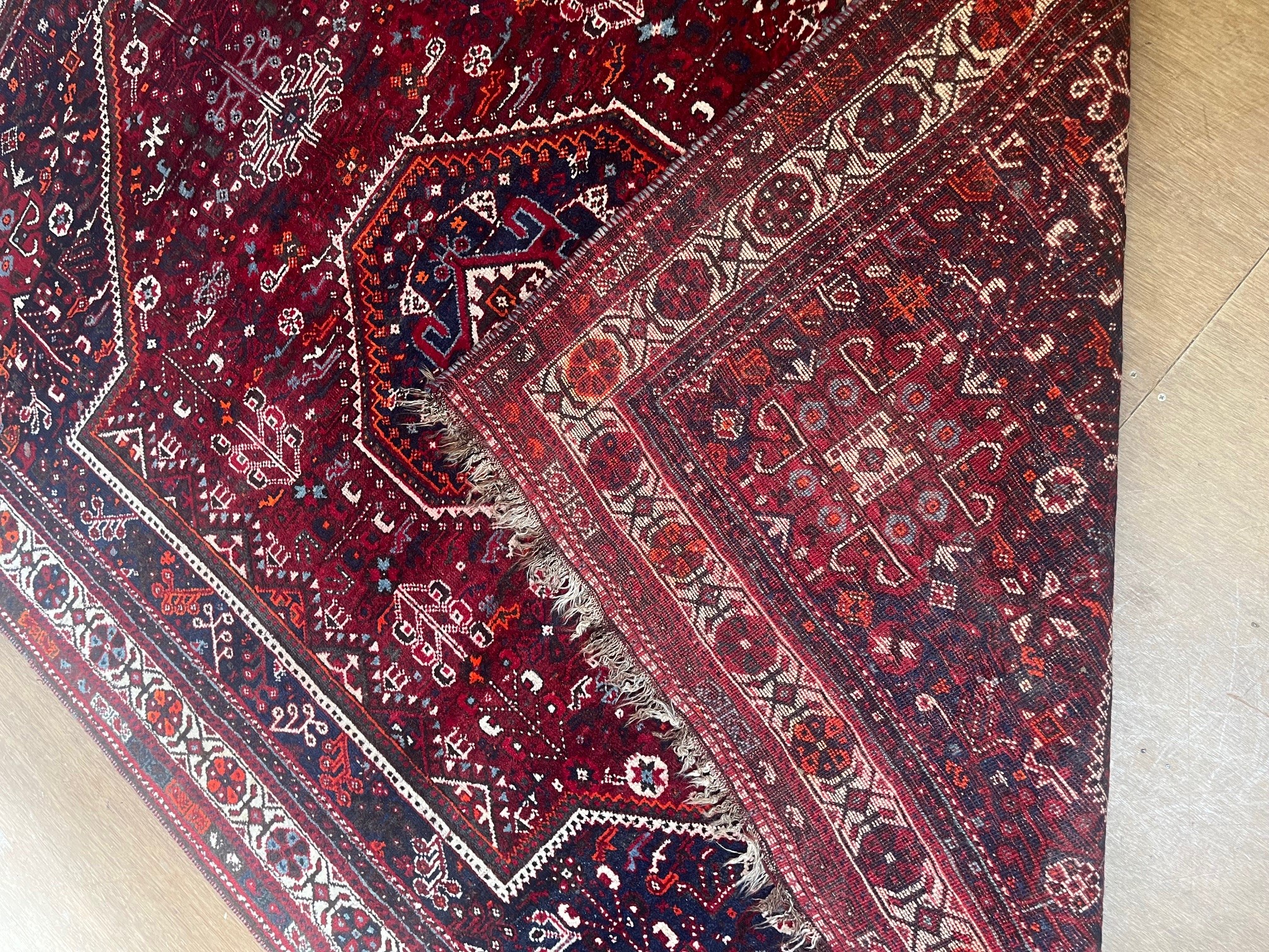 A PERSIAN TRIBAL RUG Image