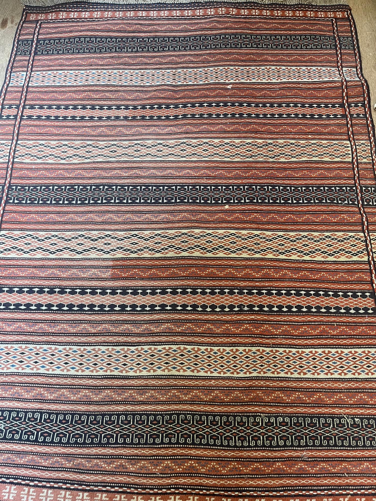 A MOROCCAN TRIBAL FLATWEAVE RUG, modern, the pattern comprising alternating geometric bands in blue Image