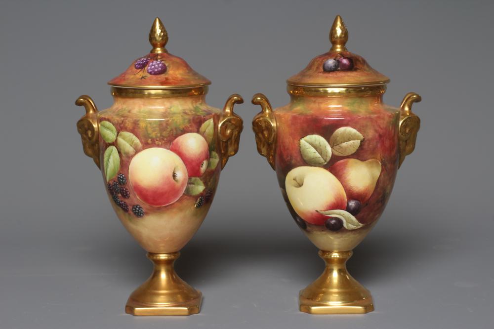 A PAIR OF COALPORT VASES AND COVERS Image