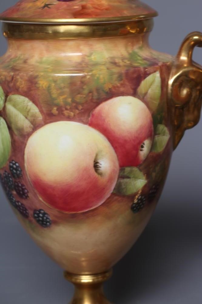 A PAIR OF COALPORT VASES AND COVERS Image