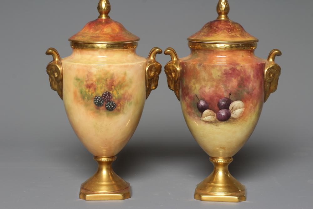 A PAIR OF COALPORT VASES AND COVERS Image