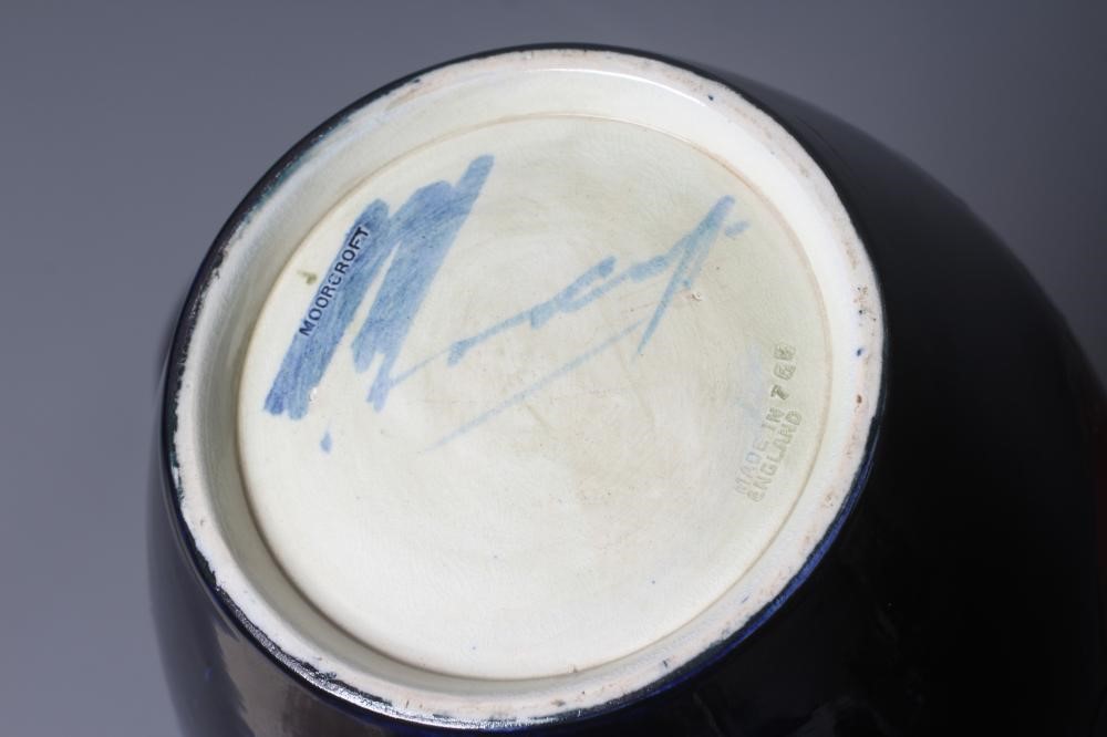 A MOORCROFT POTTERY POMEGRANATE PATTERN JAR AND COVER Image