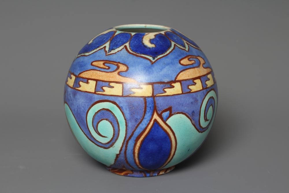 A CLARICE CLIFF NEWPORT POTTERY BIZARRE INSPIRATION SPHERICAL VASE painted in shades of blues and Image