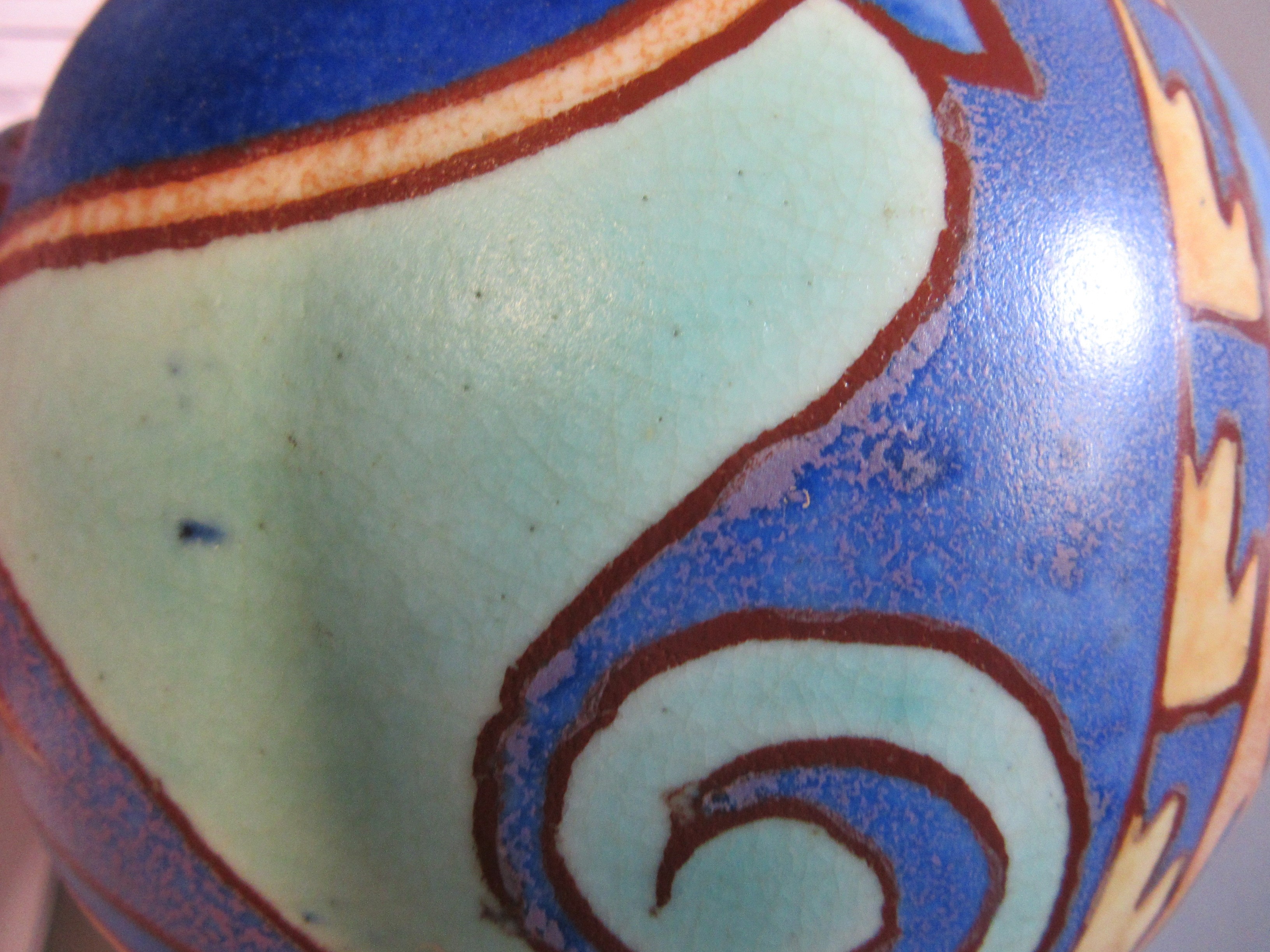 A CLARICE CLIFF NEWPORT POTTERY BIZARRE INSPIRATION SPHERICAL VASE painted in shades of blues and Image